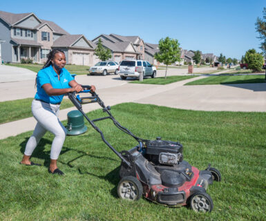 atHome employee mowing lawn