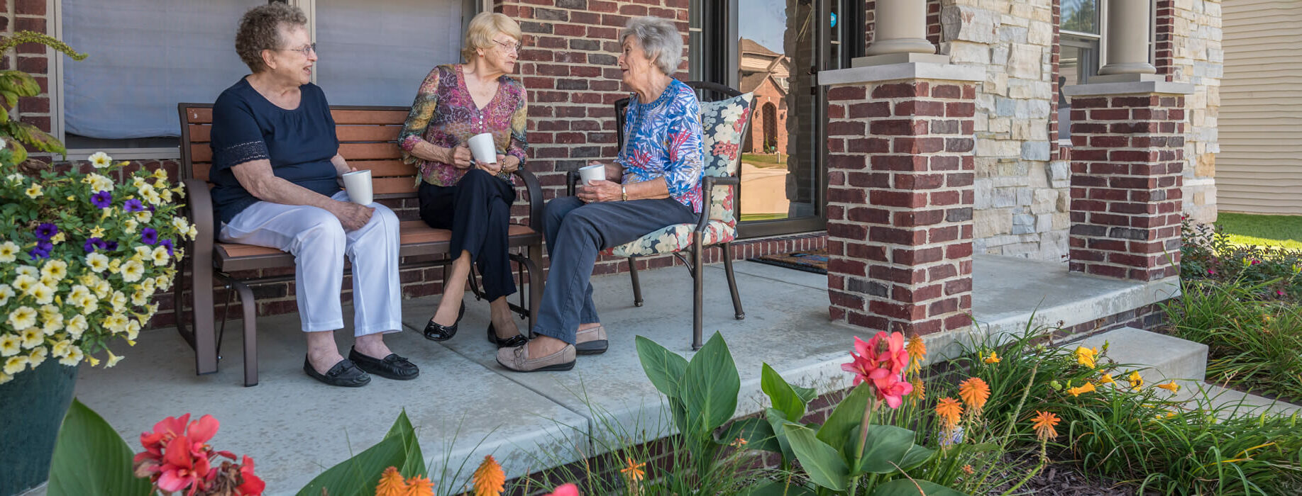 residents socializing on porch